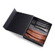 An open black presentation box on a white background, containing several slim packets. The packets are arranged in two rows: the top row is black with gold lettering reading 'ANCIENT BRAVE', and the bottom row is metallic bronze/copper with matching lettering.
