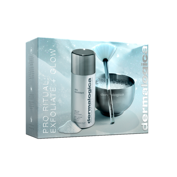 Dermalogica Pro Ritual Exfoliate + Glow kit packaging, featuring a silver bottle and a metal bowl with exfoliating powder on a light icy blue background.