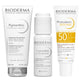 Three Bioderma skincare products on a plain white background: a white tube of PigmentboFoaming cream, a white bottle of PigmentboC-Concentrate, and a white tube of Photoderm Spot-AGE with a yellow sun protection panel.