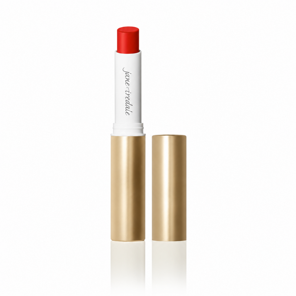 A red lipstick in a white and gold tube, shown open with the cap placed beside it on a clean white background.