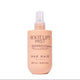 A bottle of NAK HAIR Root Lift Mist in a soft peach-pink color, featuring a clear spray top and black text on a clean white background.