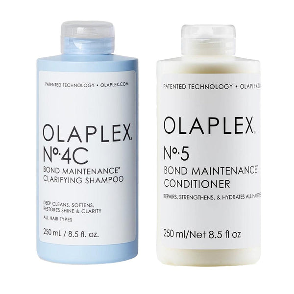 Olaplex shampoo and conditioner bottles on a white background
