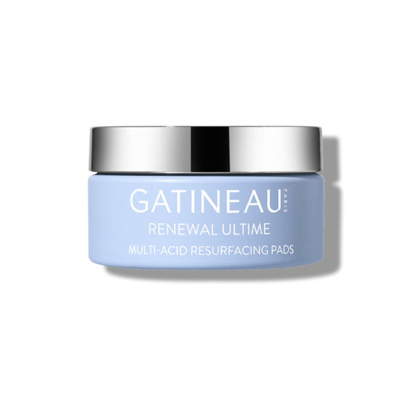 A light blue cosmetic jar with a reflective silver lid, labeled GATINEAU RENEWAL ULTIME, on a clean white background.