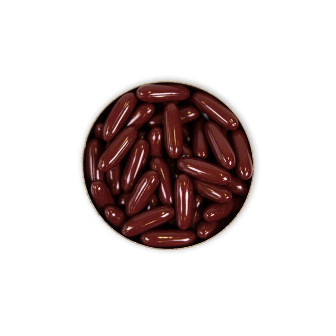 An open box of Advanced Nutrition Programme Skin Moisture Lock revealing the red capsules