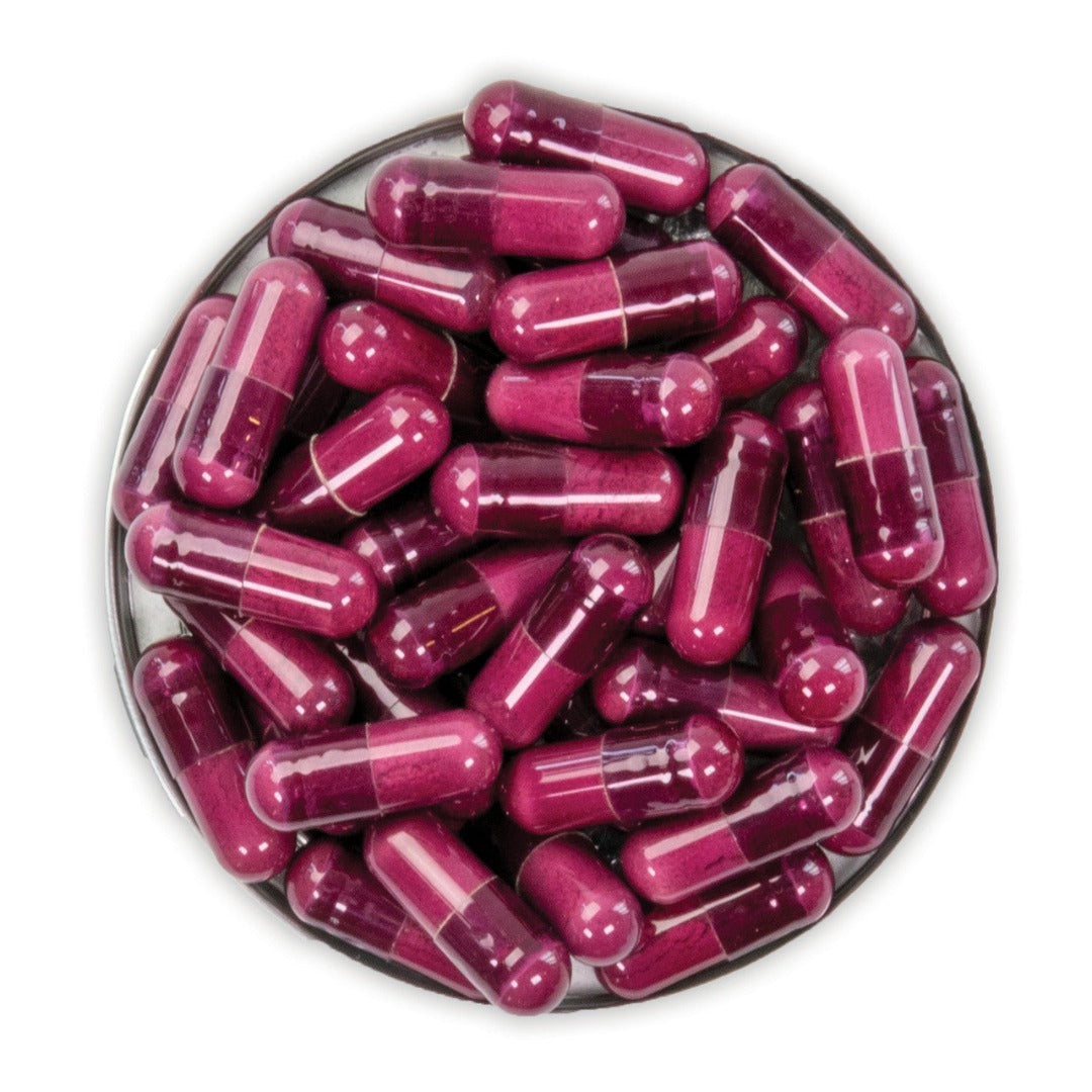 an open top of Advanced Nutrition Programme Skin Complete Duo 120 Pack showing a range of red capusles