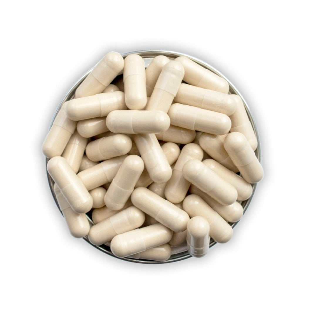 an open top of Advanced Nutrition Programme Skin Complete Duo 120 Pack showing a range of white capsules