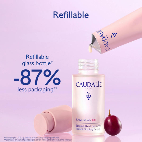 Caudalé Paris refillable glass bottle serum advertisement showing a pink applicator tube being emptied into a frosted bottle, with promotional text on a light lavender background.