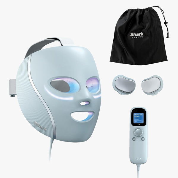 Facial mask device with attachments and carrying bag on a white background