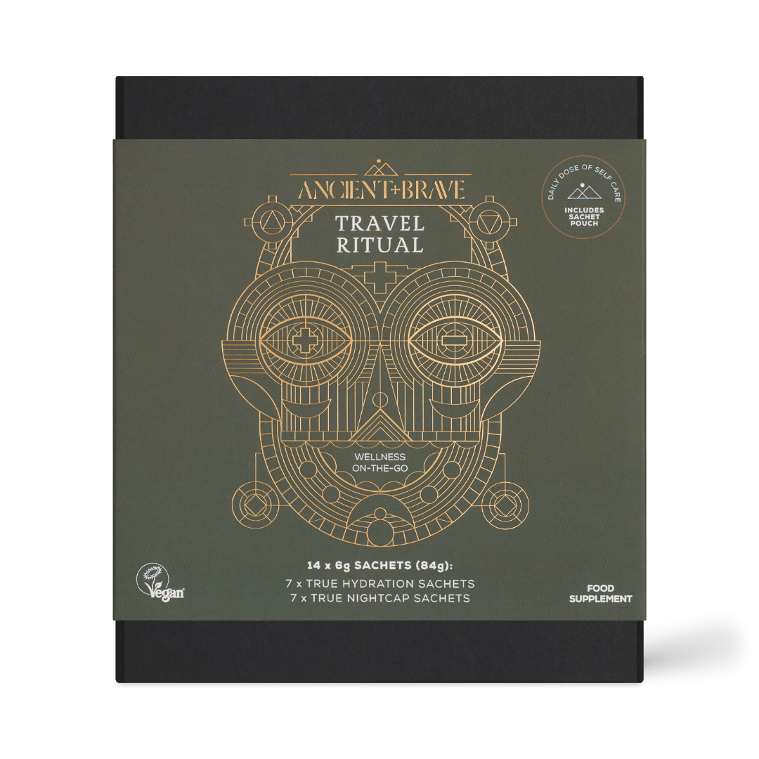 Ancient Brave Travel Ritual Wellness On-The-Go supplement box, featuring a dark olive green front with gold geometric owl artwork and black sides, shown on a white background.