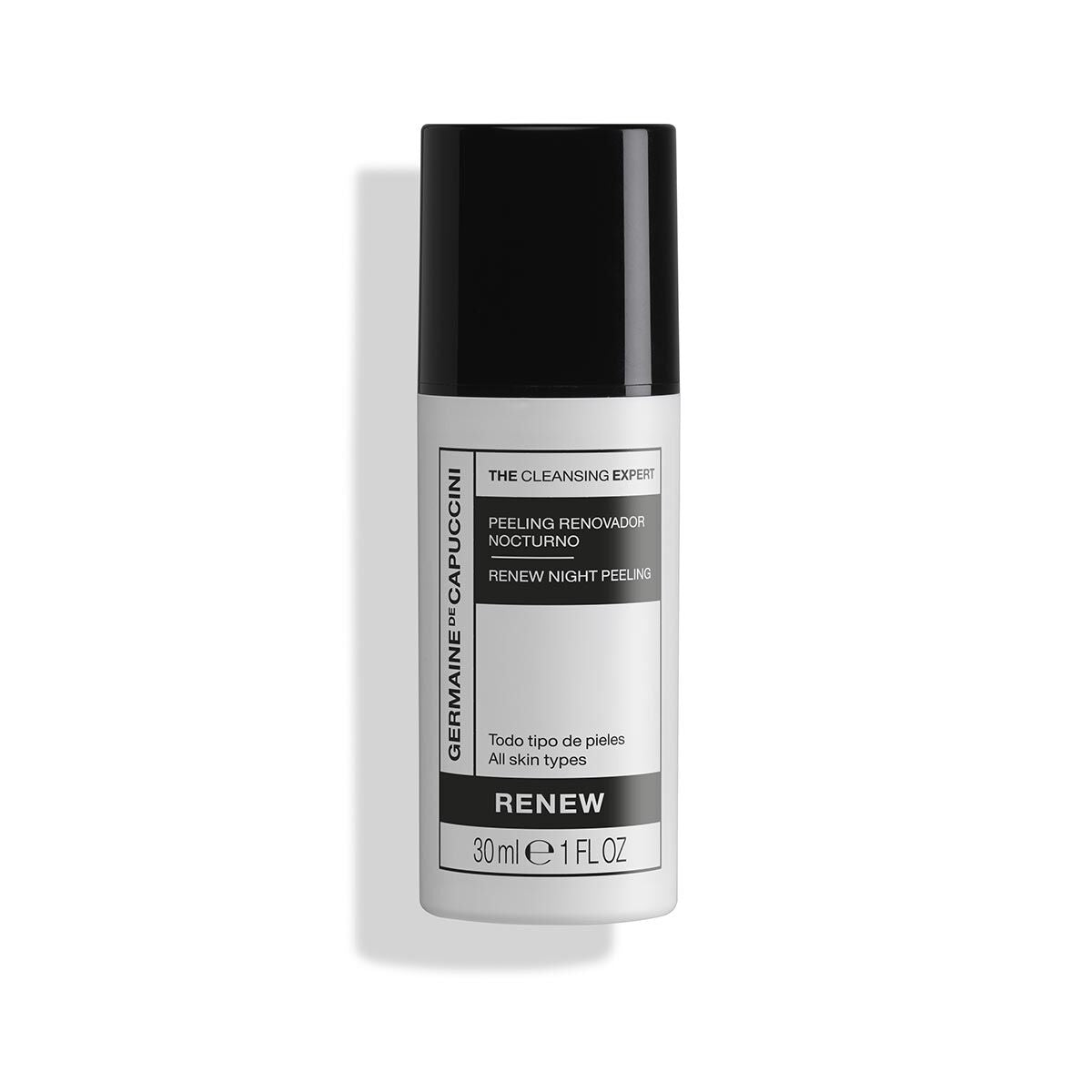 Skincare bottle with black cap and white label on a white background