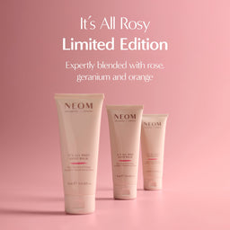 Three NEOM skincare products on a pink background with text about the 'It's All Rosy' limited edition.