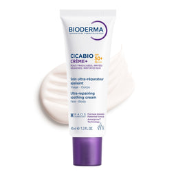 Bioderma Cicabio Crème+ SPF 50+ ultra-soothing cream in a white squeeze tube with a purple cap, shown on a white background with a cream smear behind it.