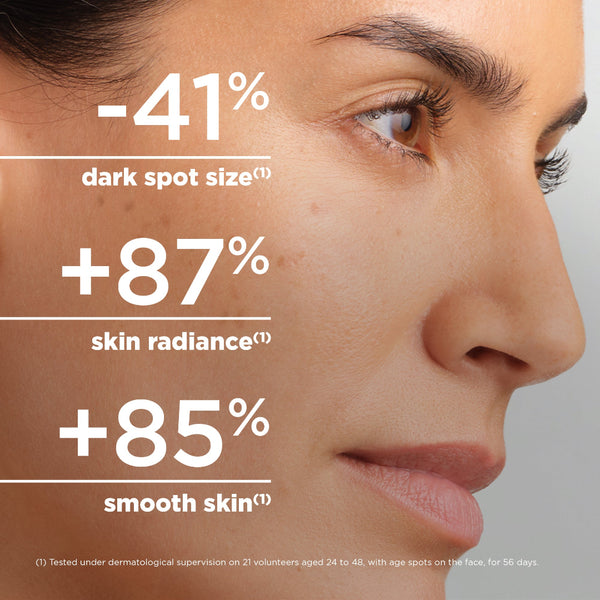 Close-up of a woman's face with large text overlays claiming results for dark spot size, skin radiance, and smooth skin.