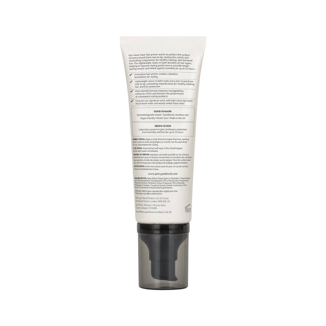The back of a white squeeze tube with black text, featuring a dark gray pump dispenser, shown on a plain white background.