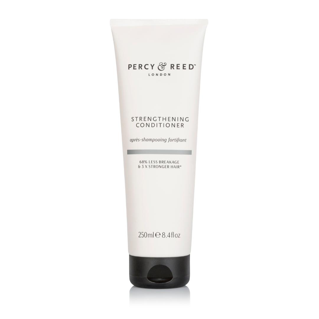 Percy Reed London Strengthening Conditioner in a 250ml (8.4 fl oz) white squeeze tube with a black cap, shown on a clean white background.