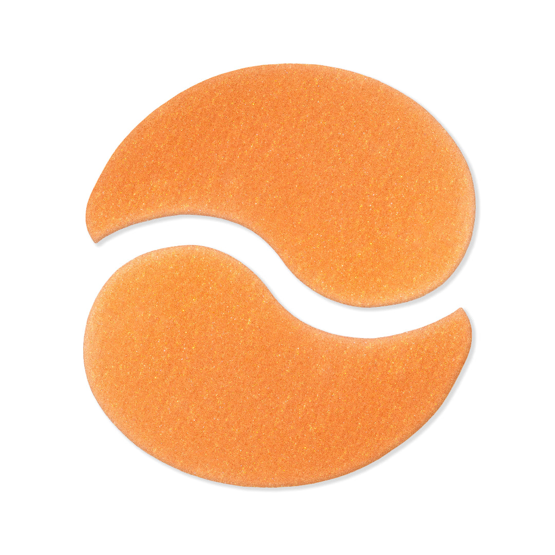 Two orange adhesive patches on a white background