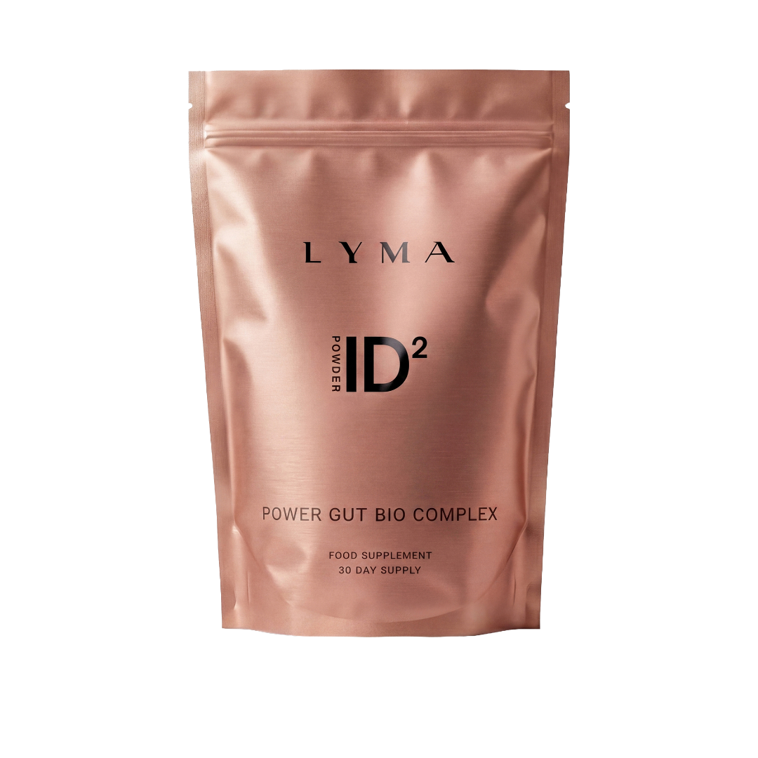 A metallic rose gold stand-up pouch of Lyma ID2 Power Gut Bio Complex food supplement, shown on a plain white background.