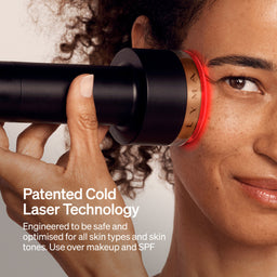 Person using a cold laser device on their face with text about patented cold laser technology.