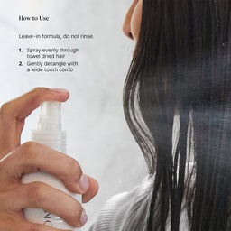 A close-up of a person with long dark hair holding a white spray bottle and spraying hair product onto their hair. Black text on the left reads 'How to Use' with two steps for application.