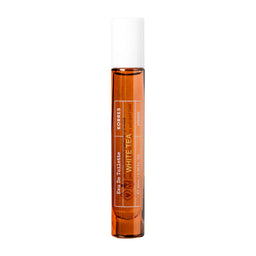 A roll-on perfume bottle with amber-colored liquid and a white cap, labeled 'White Tea' by Parfums de Marly, set against a plain white background.