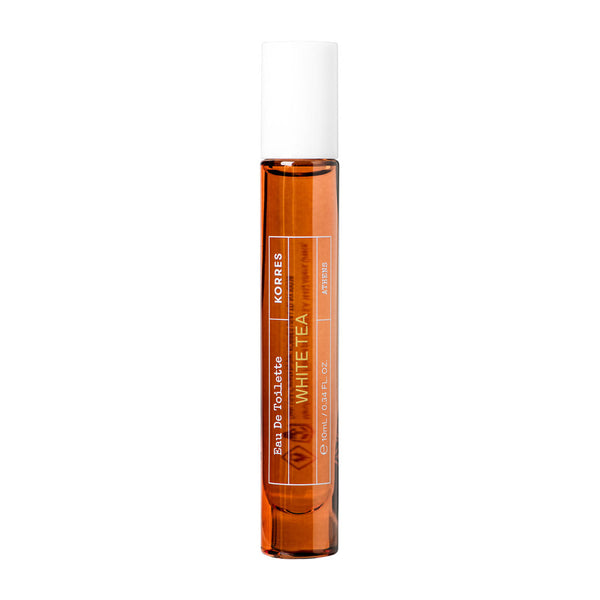 A roll-on perfume bottle with amber-colored liquid and a white cap, labeled 'White Tea' by Parfums de Marly, set against a plain white background.