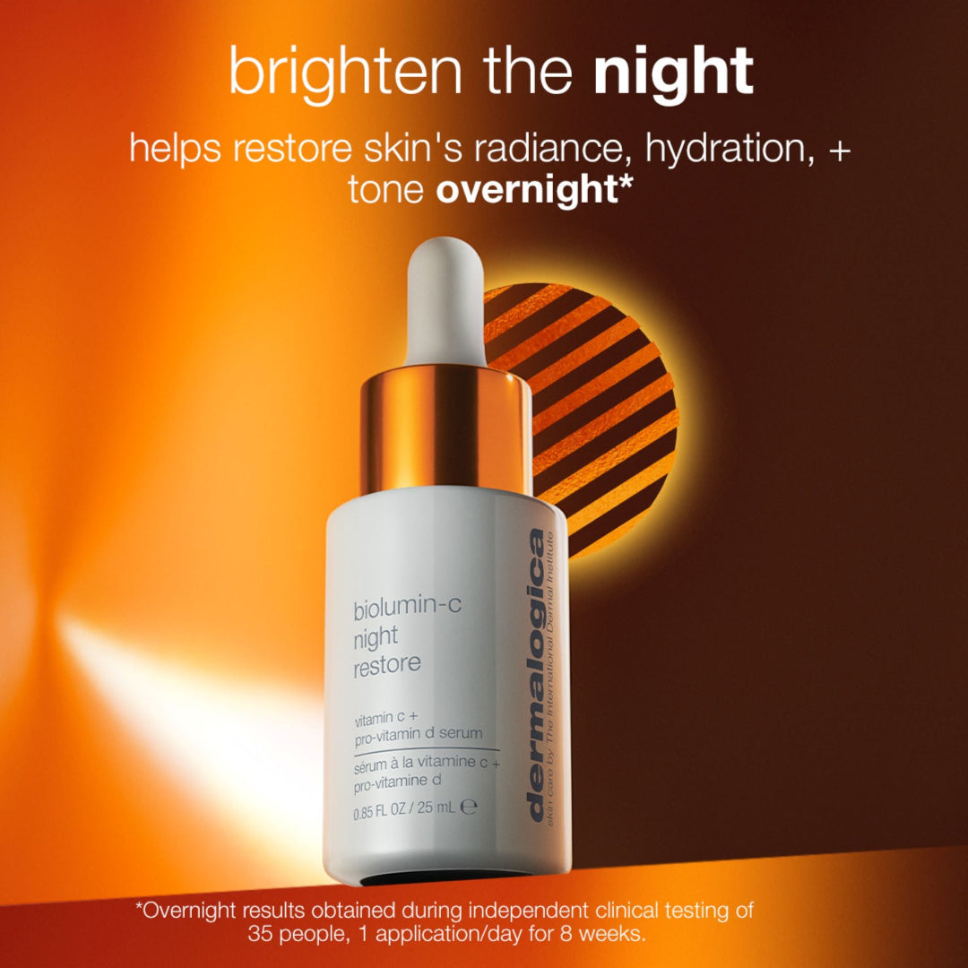 Dermalogica biominc-c night restore serum bottle with glowing effect on a warm-toned background