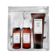 Sachajuan hair care set in a clear zippered pouch, featuring a brown hair retainer treatment tube and two brown bottles with white caps, shown on a white background.