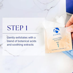 IS Clinical Active Peel System step 1 packet held by a hand on a marble surface