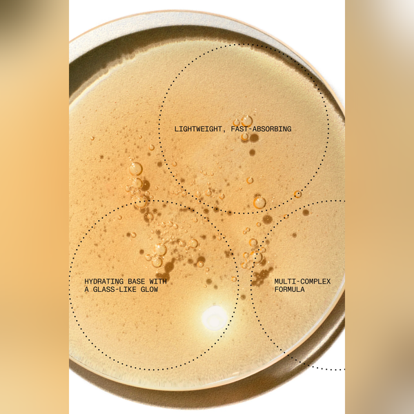 A close-up of a beige cosmetic or skincare cream with visible bubbles and overlaid text circles reading 'LIGHTWEIGHT, FAST-ABSORBING,' 'HYDRATING BASE WITH A GLASS-LIKE GLOW,' and 'MULTI-COMPLEX FORMULA.'.