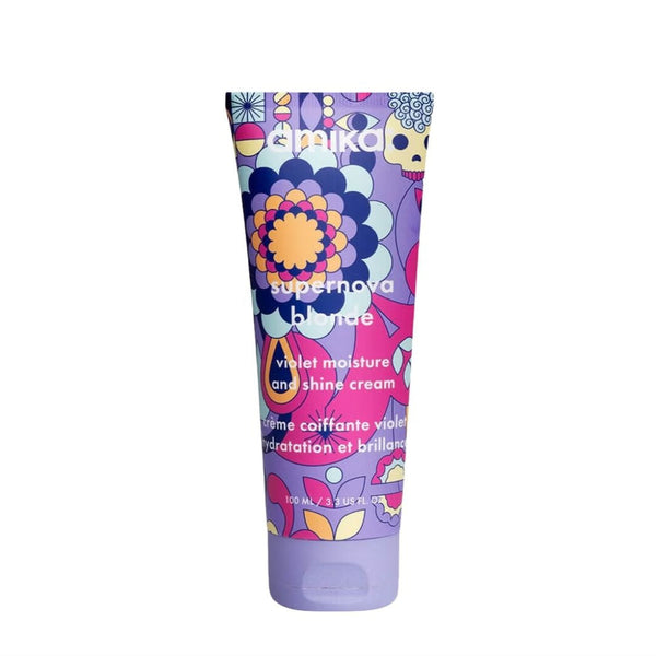 Colorful hair product tube with floral design on a white background
