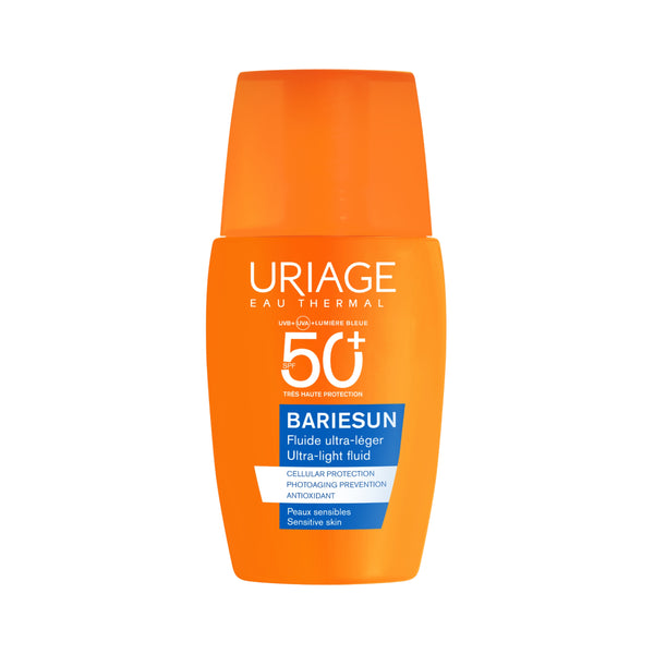 A bottle of Uriage Bariesun 50+ sunscreen fluid, featuring a bright orange design with white and blue text, set against a plain white background.