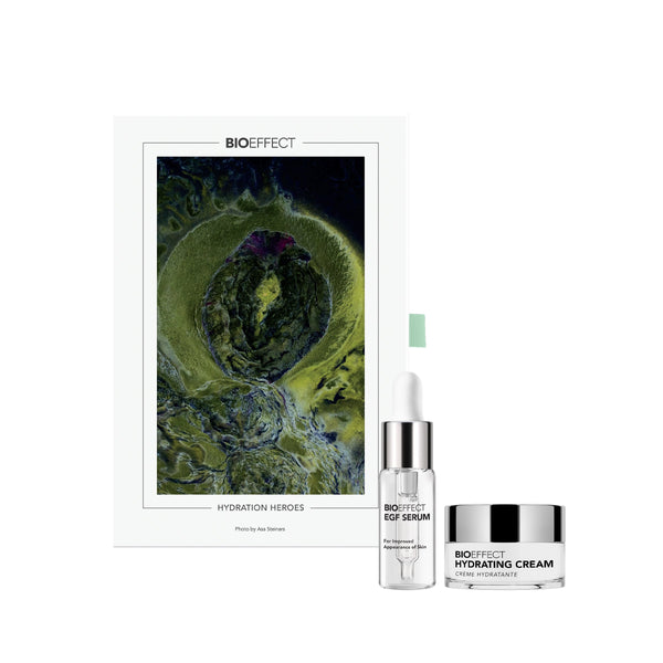 Bioeffect skincare products including serum, cream, and a poster on a white background
