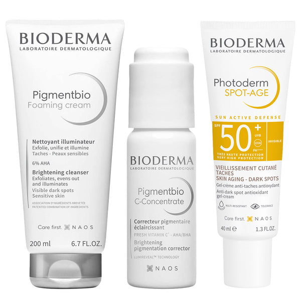 Three Bioderma skincare products on a plain white background: a white tube of PigmentboFoaming cream, a white bottle of PigmentboC-Concentrate, and a white tube of Photoderm Spot-AGE with a yellow sun protection panel.