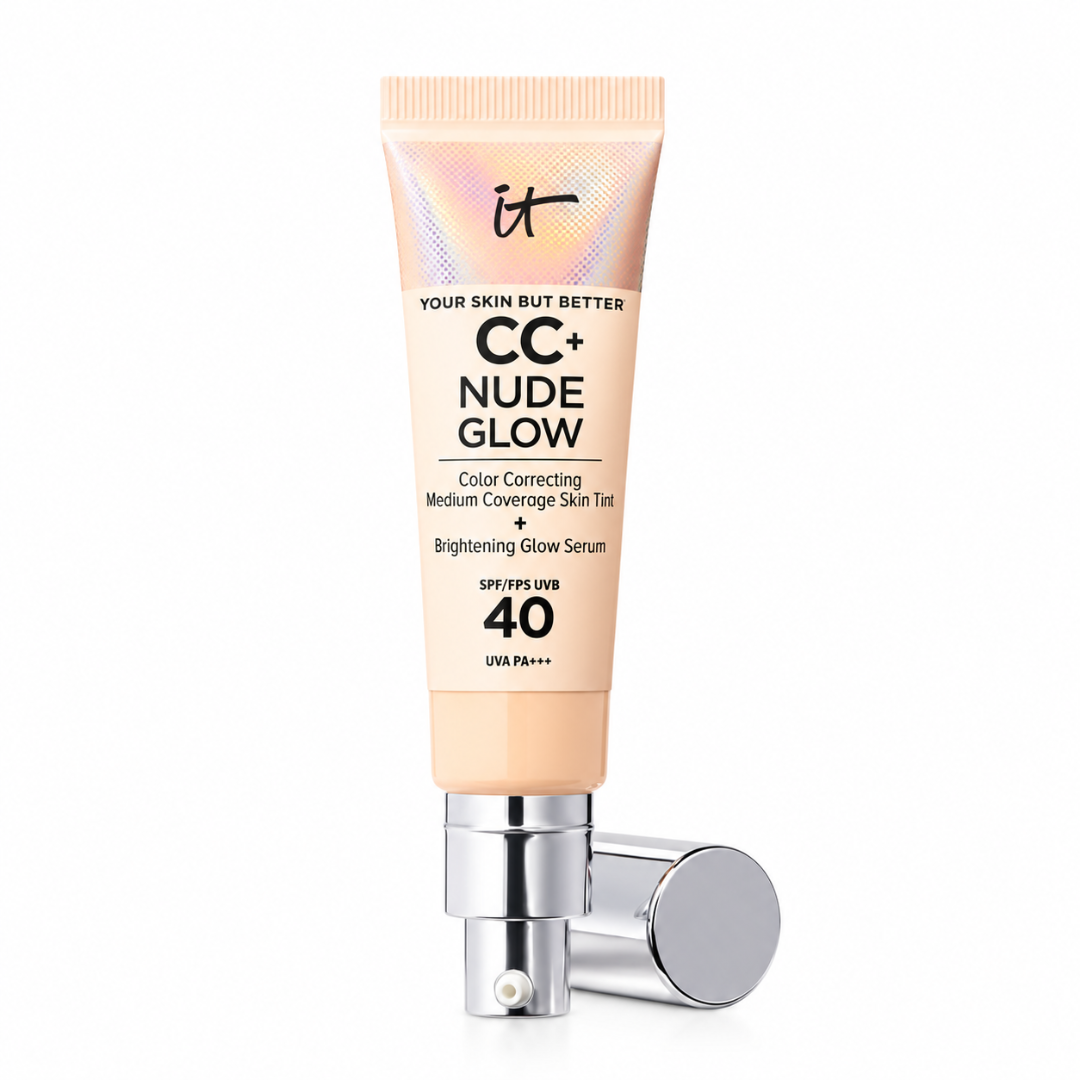 A squeeze tube of it CC+ Nude Glow Color Correcting Medium Coverage Skin Tint + Brightening Glow Serum SPF 40, shown with its silver pump dispenser lying horizontally on a clean white background.