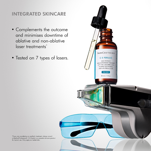 Skinceuticals C E Ferulic bottle with laser equipment on a reflective surface