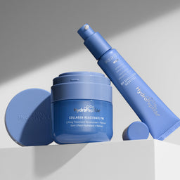 Blue skincare products with 'hydropeel' branding on a light background