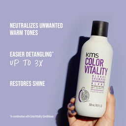 KMS Color Vitality shampoo bottle held against a purple background with product benefits text.
