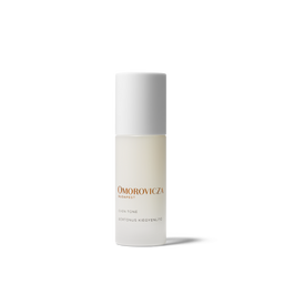 Omorovicza Harper Skin Tone Retinol Kievelit eye tone serum in a frosted glass bottle with a white cap, shown on a clean white background.