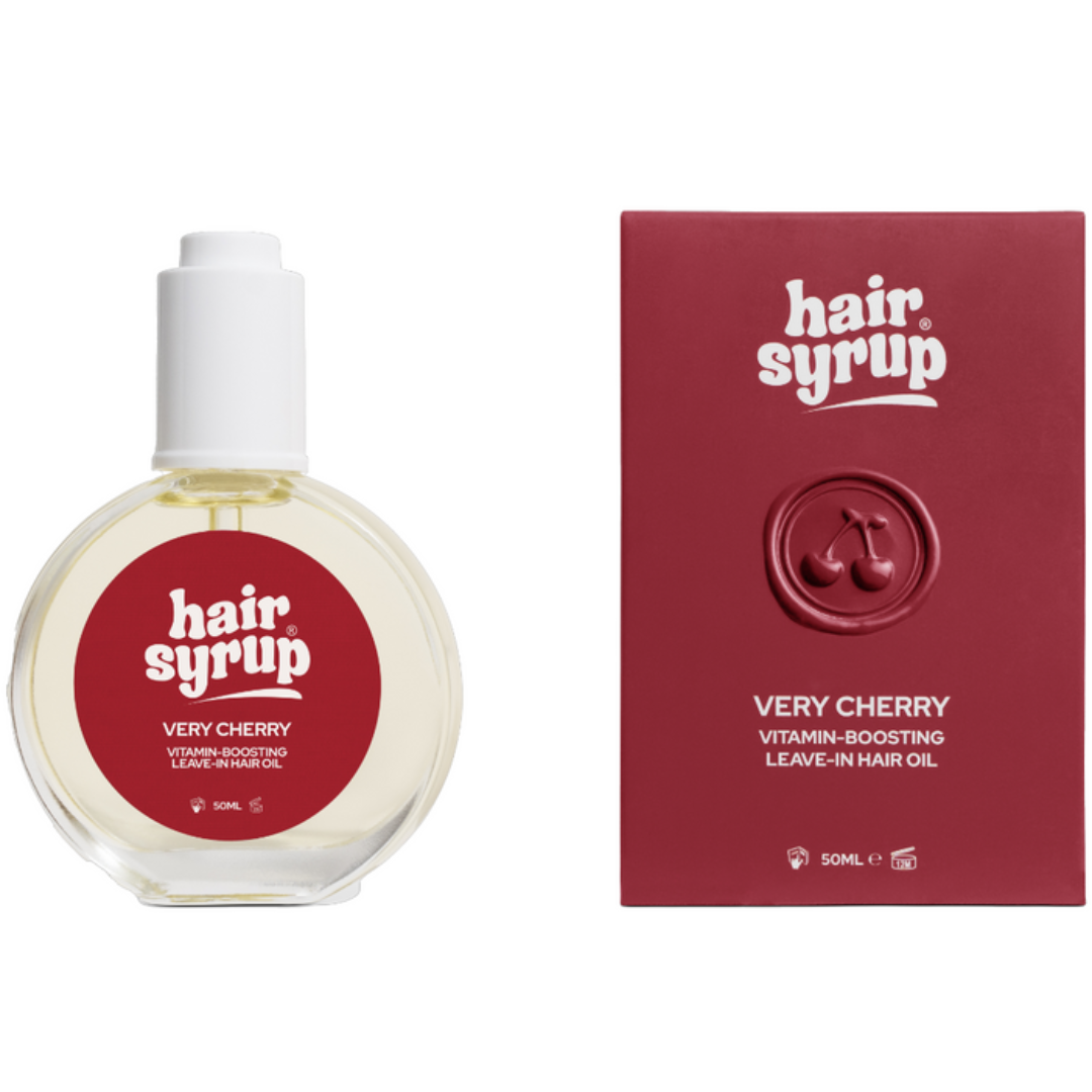 Hair syrup bottle and packaging on a white background
