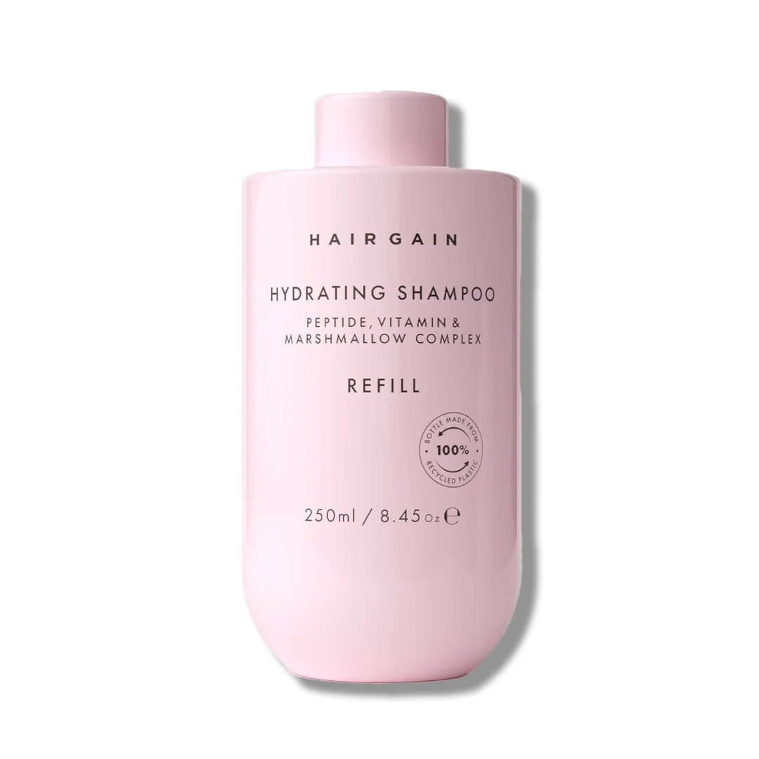 Pink bottle of Hair Gain Hydrating Shampoo refill on a white background