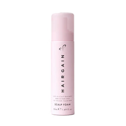Pink bottle of HairGain scalp foam on a white background