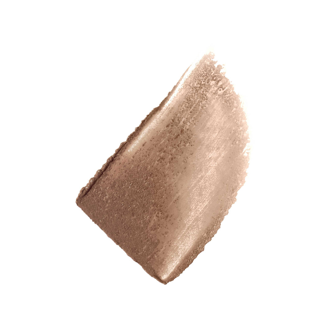 Bronze-colored makeup swatch on a white background