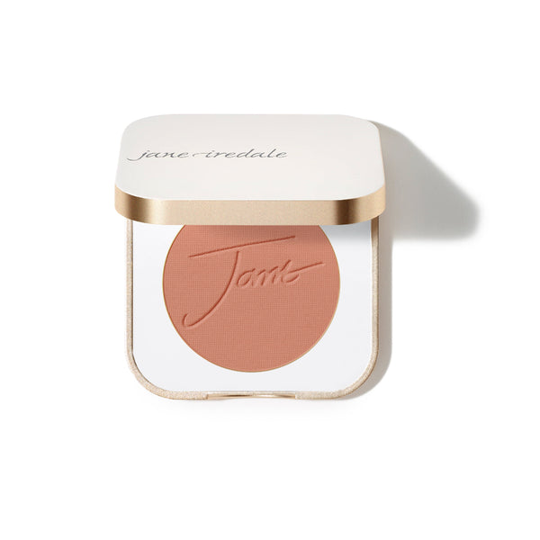 Jane Iredale bronzer in a compact case on a white background