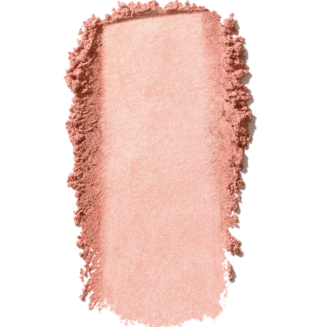 Pink makeup swatch on a white background