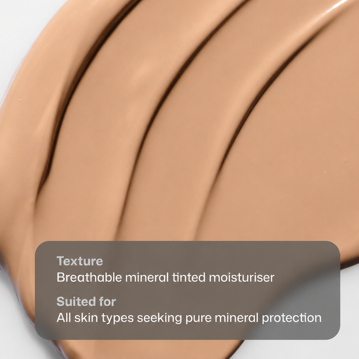 A close-up of a smooth swatch of beige mineral tinted moisturizer with text overlay detailing its texture and suitability.