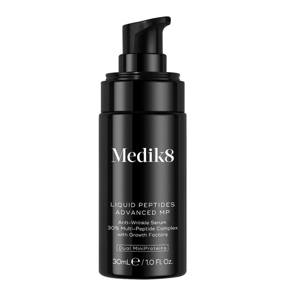 Black Medik8 serum bottle on a white background