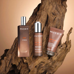 Nuxe skincare products on a wooden background
