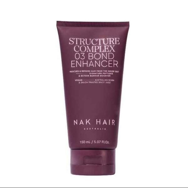 A tube of Nak Hair Structure Complex 03 Bond Enhancer in a deep plum purple color with white text, shown against a plain white background.