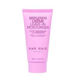Pink tube of NAK Hair Replends Creme Leave-In Moisturiser on a white background