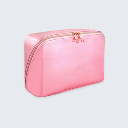 A metallic pink zippered cosmetic bag with rose gold zipper pulls and a debossed 'FULL' logo on the front, shown on a light gray background.
